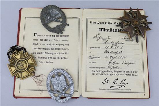 German WWII workers pass book, Spanish Cross, NSDAP medal, Coastal Artillary badge, General Assault badge